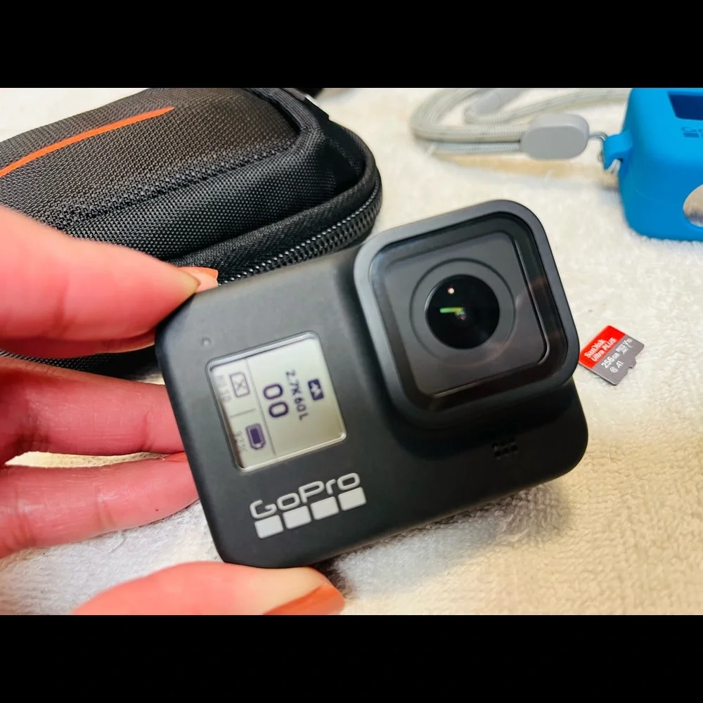 Gopro8 black,Tripod, 265gb sd card,camera bag and camera case